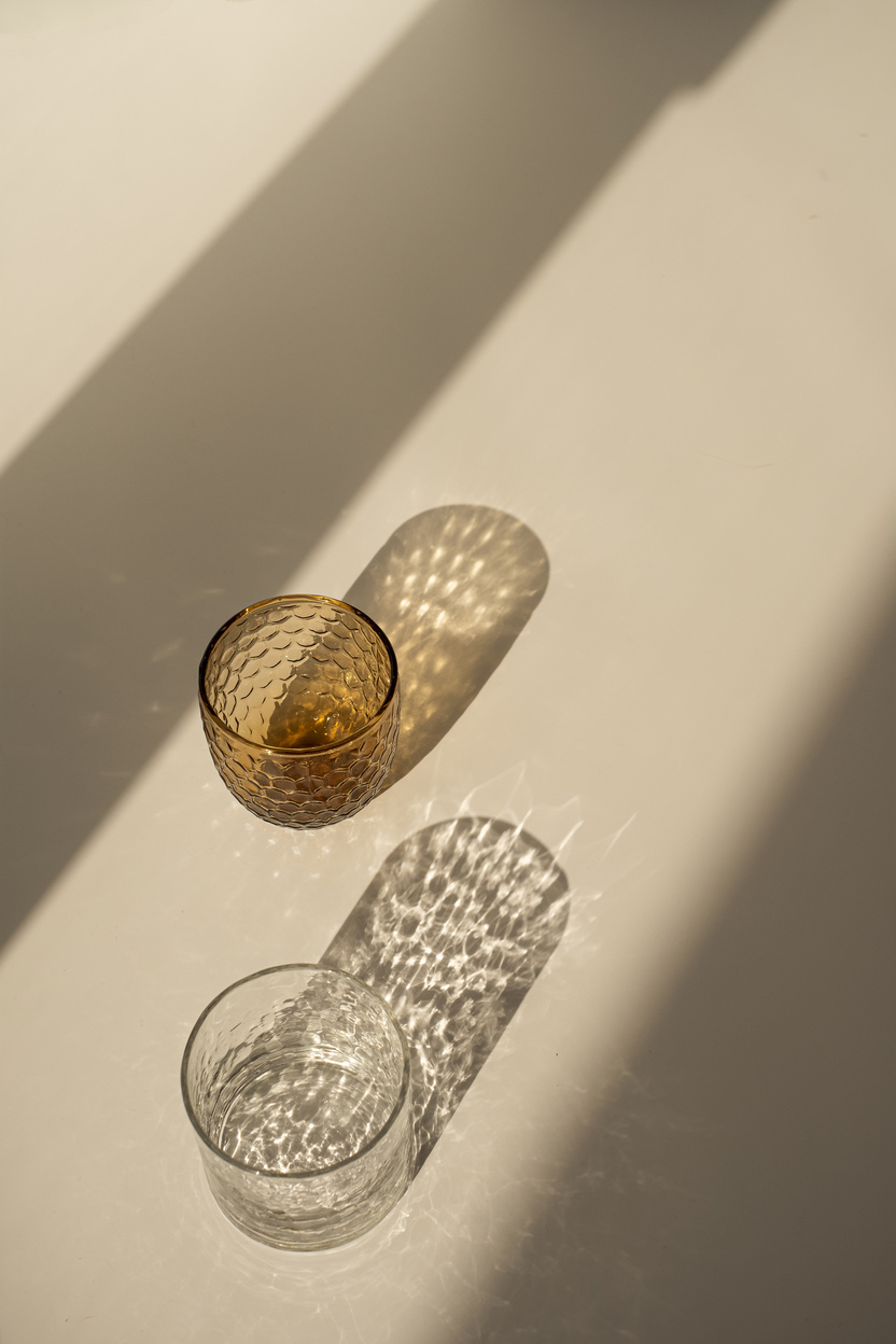 Glassware Casting Shadows on Neutral Background 